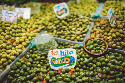 High angle view of olives for sale in market