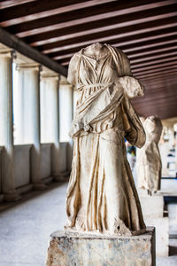 Statue of a young woman probably artemis at the stoa of attalos in athens