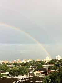 Rainbow over city