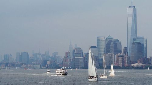 Boats sailing in sea