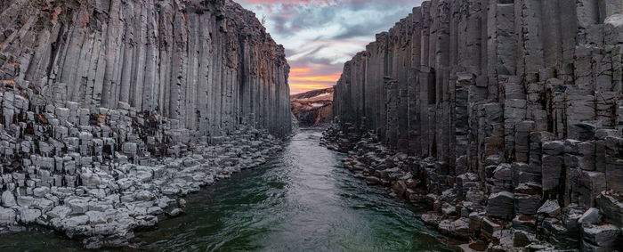 Epic view of the studlagil basalt canyon, iceland.