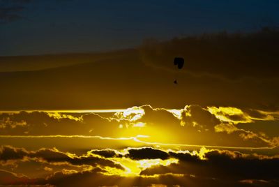 Low angle view of hot air balloon against sky during sunset