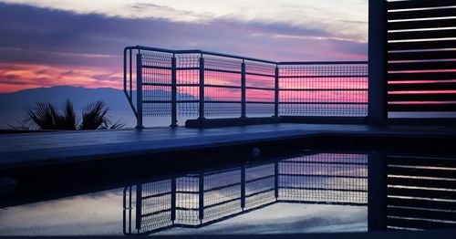 Built structure against sky during sunset