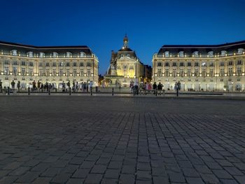 Tourists in front of building