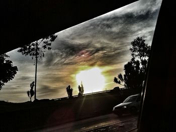 Low angle view of road against cloudy sky