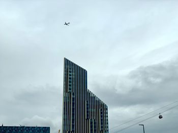 Low angle view of modern buildings against sky