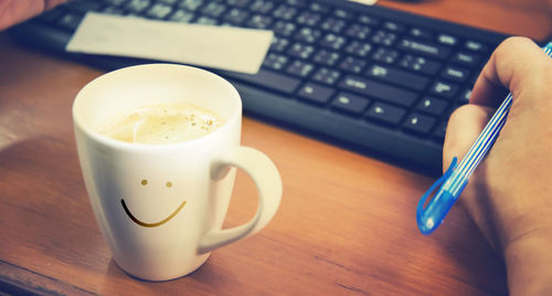 Close-up of coffee cup on table