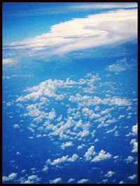 Scenic view of landscape against cloudy sky