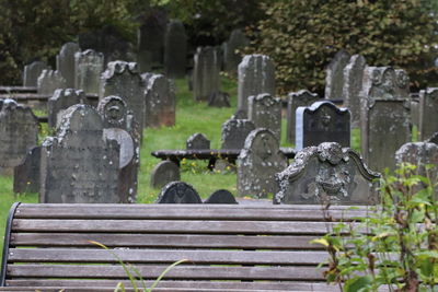 Old empty bench at cemetery