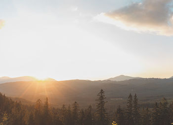 Scenic view of mountains against sky during sunset