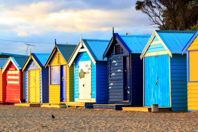 Beach huts against sky