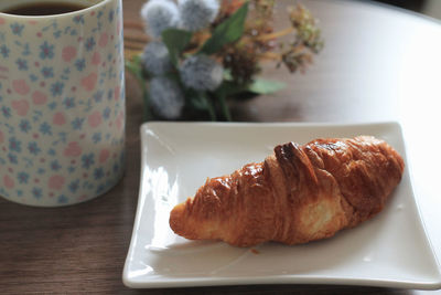 Close-up of breakfast served on table