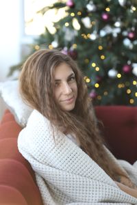 Portrait of young woman looking away