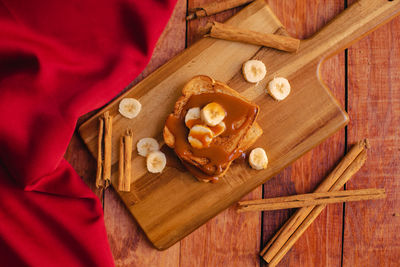 High angle view of cookies on cutting board