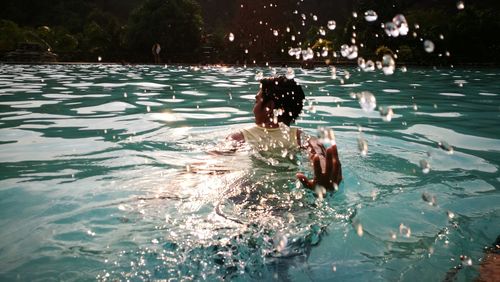 People swimming in pool