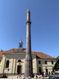 View of historical building against clear blue sky