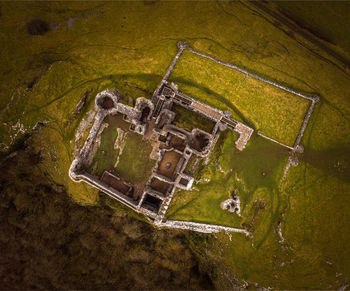 High angle view of old ruin on field