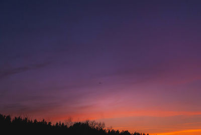 Low angle view of dramatic sky during sunset