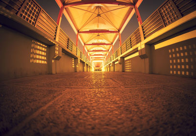 Surface level of illuminated corridor of building