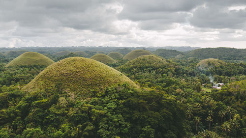 Scenic view of hills against sky