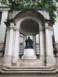 Low angle view of statue of historic building