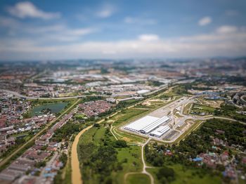 Aerial view of cityscape against sky