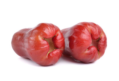 Close-up of apple against white background