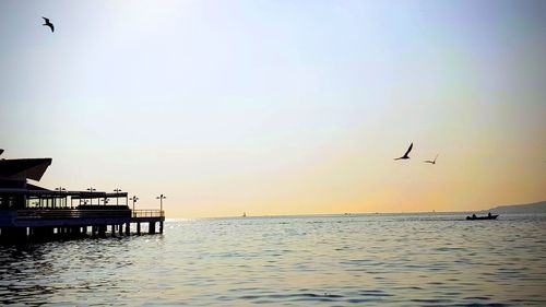 Scenic view of sea against sky during sunset