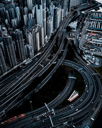 Aerial view of elevated road amidst buildings in city