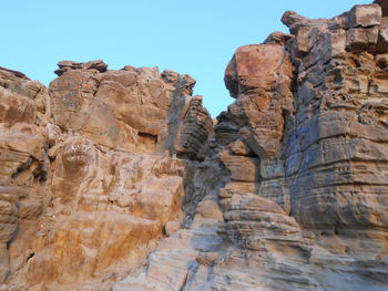 Low angle view of rock formations