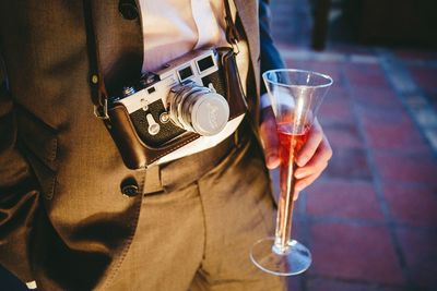 Close-up of man holding drink