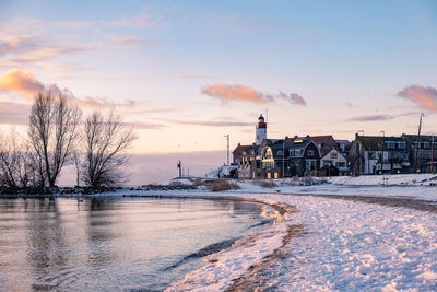 View of frozen lake against sky during winter