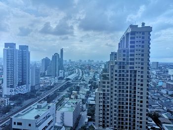 High angle view of buildings against sky in city