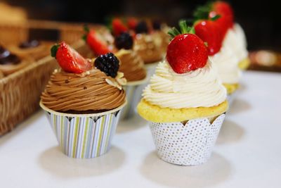 Close-up of cupcakes on table