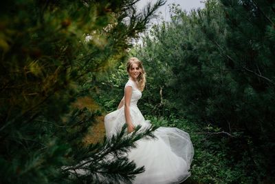 Portrait of woman in forest