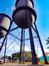 Low angle view of water tower against sky