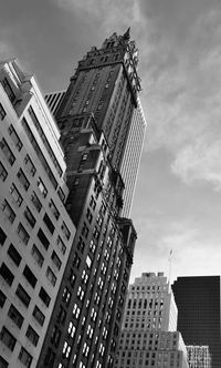 Low angle view of buildings in city against sky