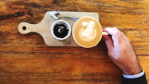 High angle view of coffee cup on table