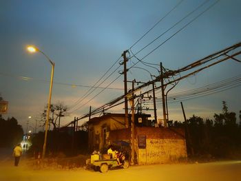 Electricity pylon against sky