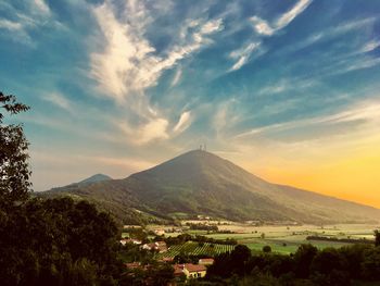 Scenic view of mountains against sky during sunset