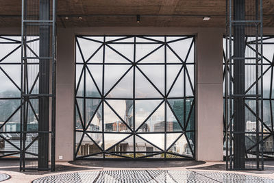 View of building seen through glass door