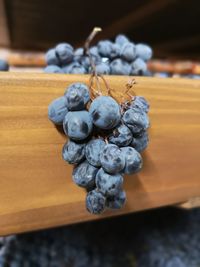 Close-up of grapes on table