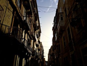 Low angle view of narrow street in old town