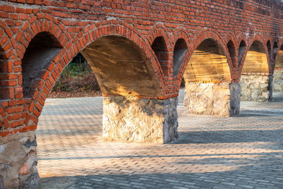 An ancient red arch bridge