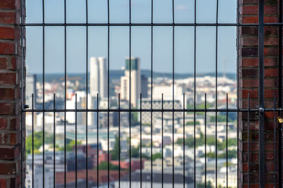 Cityscape seen through glass window