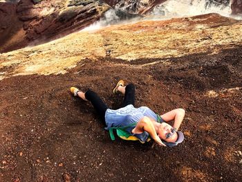 Girl lying on ground