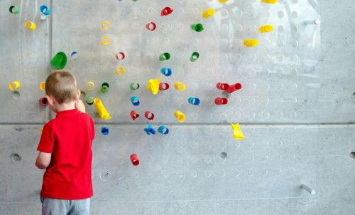 Girl playing with arms raised