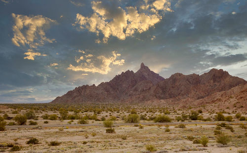 Scenic view of mountains against sky during sunset