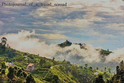 Scenic view of landscape against cloudy sky