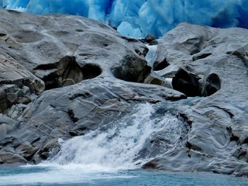 Close-up of rocks in water